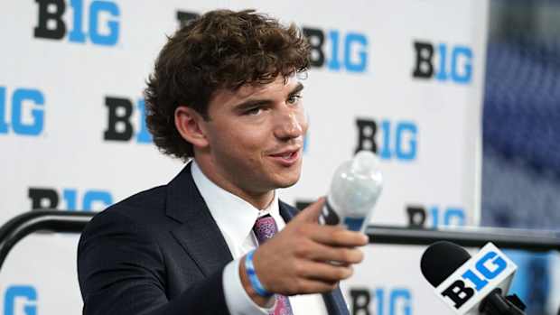 Wisconsin quarterback Graham Mertz talks to the media during Big 10 football media days at Lucas Oil Stadium.